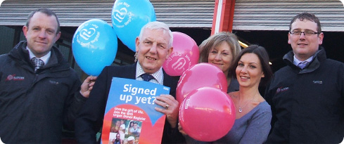 Graham Wagstaff with family and staff of Saturn Motor Company